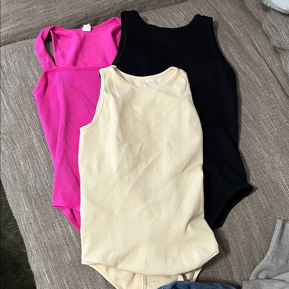 6 Ribbed and plain Tank Bodysuits in Pink, Cream, 2 Black, brown and green
